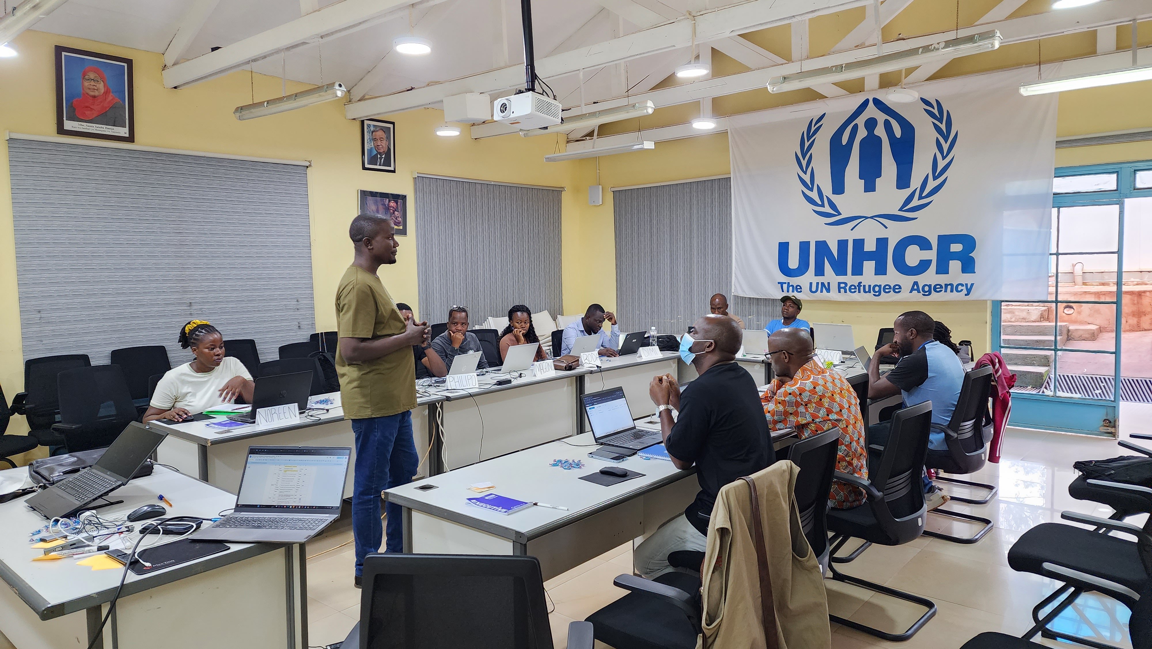 A team of trainees from UNHCR, NRC and DRC during a 10-day intensive training session at the UNHCR HQ offices at Kasulu. Photo credit: Humanitarian OpenStreetMap Team