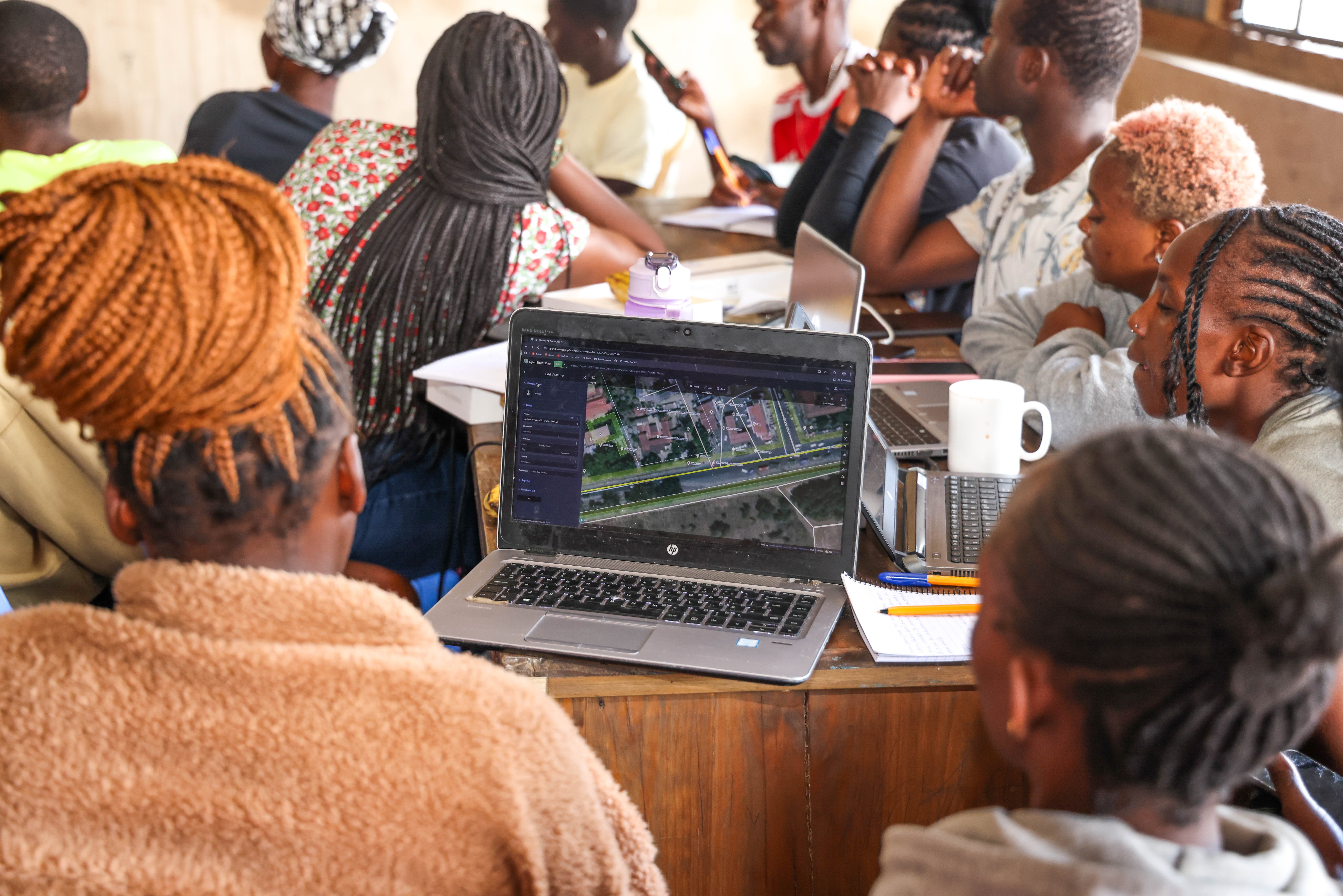 Participants practise OSM mapping and digitisation during the three-day GIS and mapping training, Mathare, March 2025. | Photo: HOT / SDI Kenya