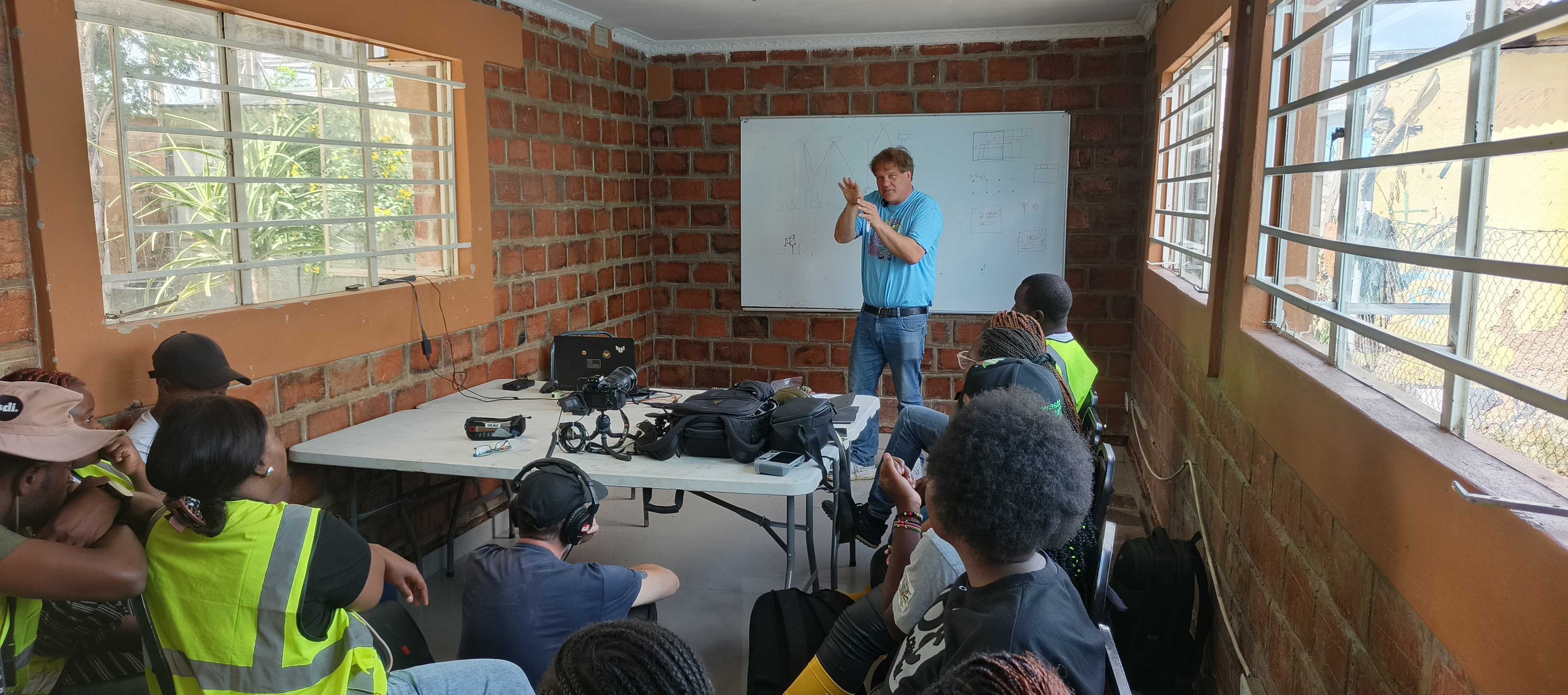 Ivan Buendía Gaytán, HOT Product Innovation Manager and Humanitarian Advisor, training community members in drone mapping, Lusaka, March 2026. | Photo: Kennedy Jomokelo
